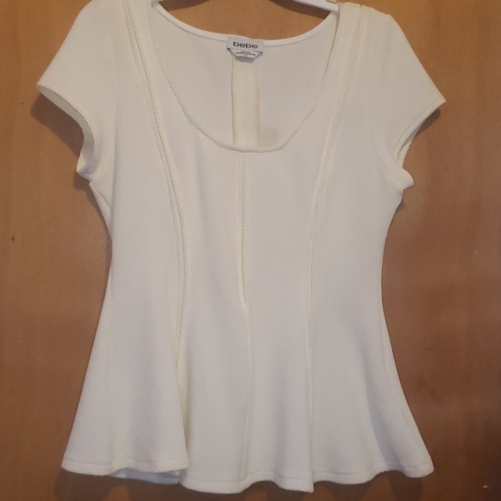 Bebe Peplum top